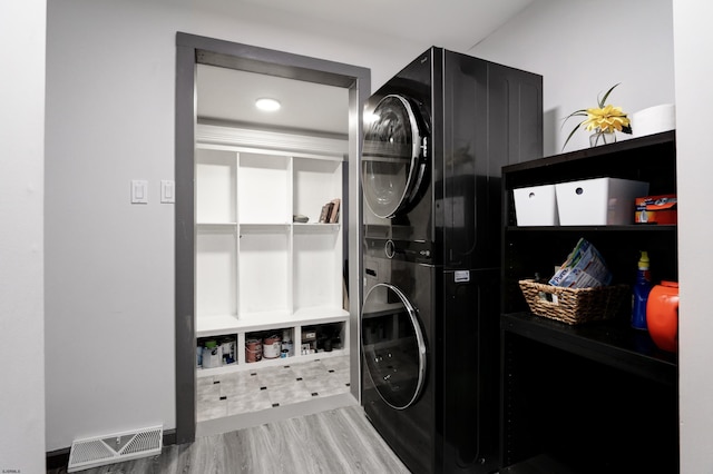 106 Hillside Ave, Absecon, NJ 08201 - washroom featuring estacked washer and dryer and wood finished floors