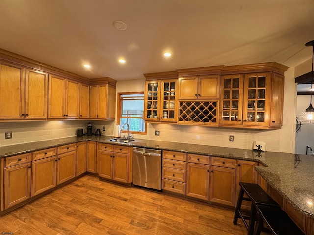 2313 Burroughs Ave, Northfield, NJ 08225 - kitchen with dishwasher, brown cabinets, tasteful backsplash, light wood finished floors, and recessed lighting