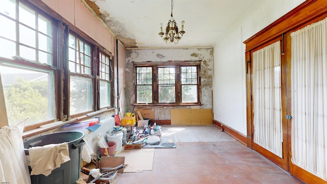 717 Wabash Ave, Atlantic City, NJ 08401 - sunroom with healthy amount of natural light and a chandelier