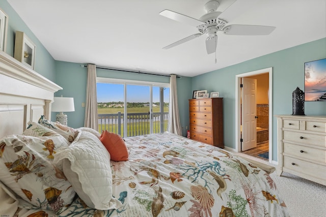 122 S Pointe Unit 122, Somers Point, NJ 08244 - bedroom featuring access to outside, a ceiling fan, connected bathroom, and carpet