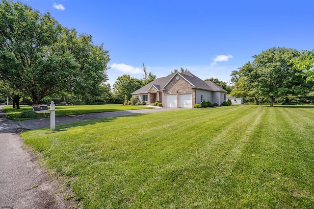 2 Clay Ct, Cape May, NJ 08204 - view of front of home with driveway, an attached garage, a front yard, and brick siding