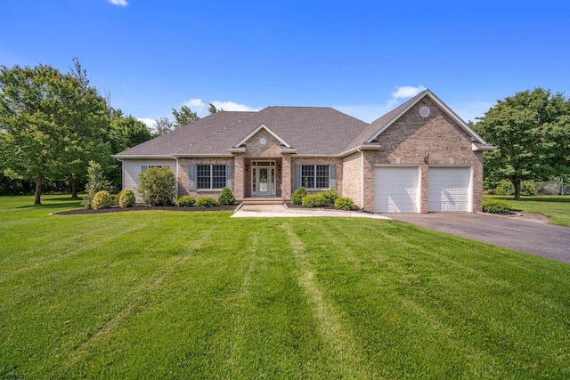 2 Clay Ct, Cape May, NJ 08204 - view of front of property featuring asphalt driveway, a garage, brick siding, and a front yard