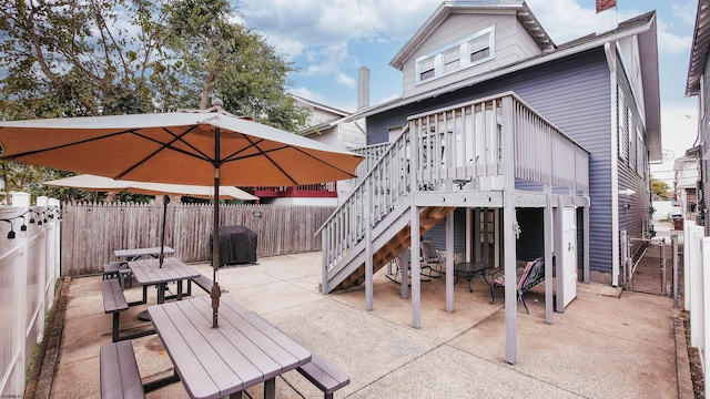 16 N Nashville Ave, Ventnor, NJ 08406 - back of property with a patio, a fenced backyard, a deck, a gate, and stairs