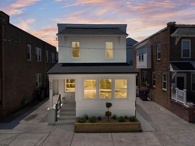 114 N Avolyn Ave, Ventnor, NJ 08406 - modern home with a shingled roof and concrete driveway