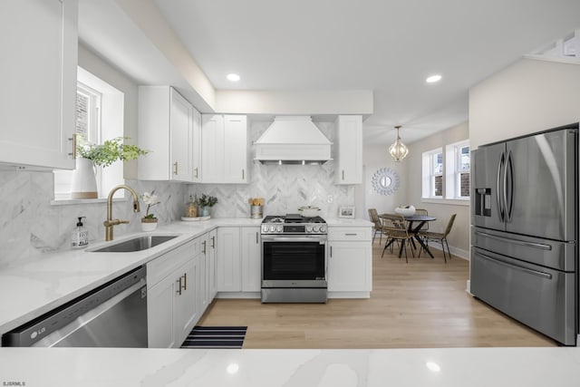 114 N Avolyn Ave, Ventnor, NJ 08406 - kitchen featuring stainless steel appliances, custom exhaust hood, white cabinetry, light stone countertops, and recessed lighting