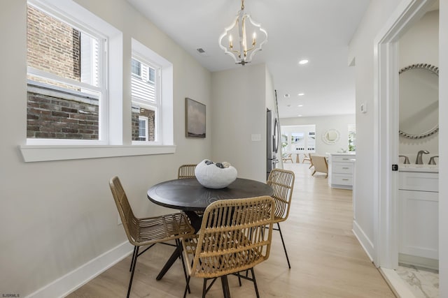 114 N Avolyn Ave, Ventnor, NJ 08406 - dining space with plenty of natural light, a chandelier, recessed lighting, and light wood-style flooring
