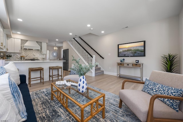 114 N Avolyn Ave, Ventnor, NJ 08406 - living room featuring stairs, light wood-style floors, and recessed lighting