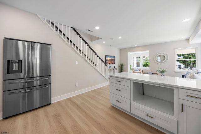 114 N Avolyn Ave, Ventnor, NJ 08406 - kitchen featuring stainless steel fridge, light countertops, light wood finished floors, and recessed lighting