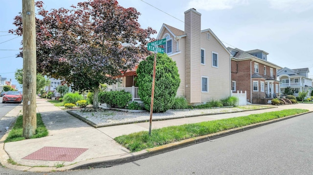2 S Barclay Ave, Margate, NJ 08402 - view of home's exterior with a residential view and a chimney