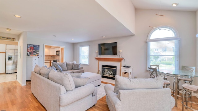 2 S Barclay Ave, Margate, NJ 08402 - living area with a tiled fireplace, light wood-style flooring, and recessed lighting