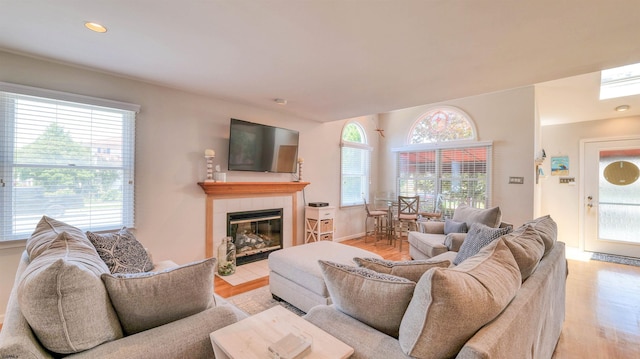 2 S Barclay Ave, Margate, NJ 08402 - living room featuring light wood-type flooring, a tile fireplace, and recessed lighting