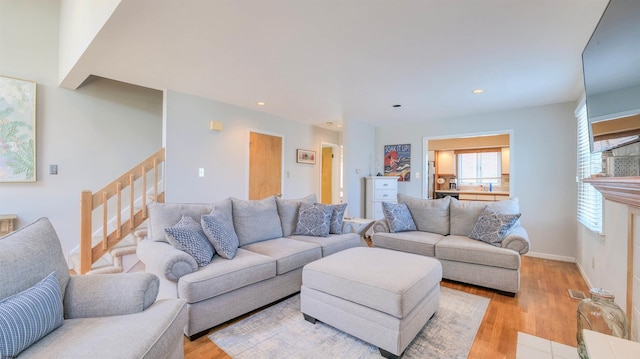 2 S Barclay Ave, Margate, NJ 08402 - living room with light wood-type flooring, stairs, and recessed lighting