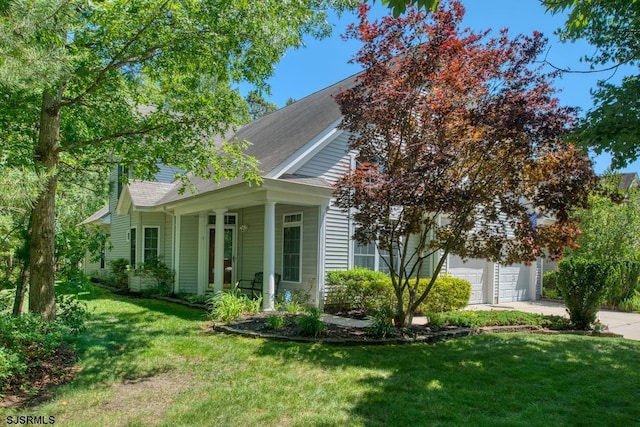 1 Poppy Rd, Egg Harbor Township, NJ 08234 - view of property exterior featuring driveway, a garage, and a lawn