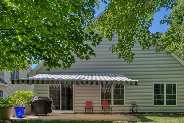 1 Poppy Rd, Egg Harbor Township, NJ 08234 - rear view of house with a patio and a metal roof