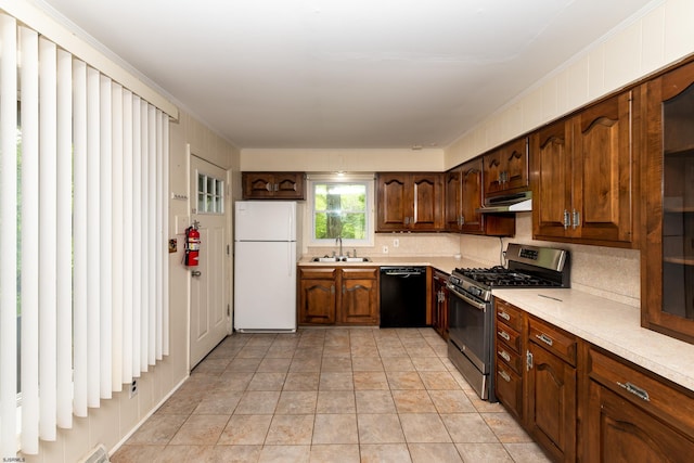 3821 Brookhaven Dr, Vineland, NJ 08361 - kitchen with freestanding refrigerator, stainless steel gas range, dishwasher, under cabinet range hood, and tasteful backsplash