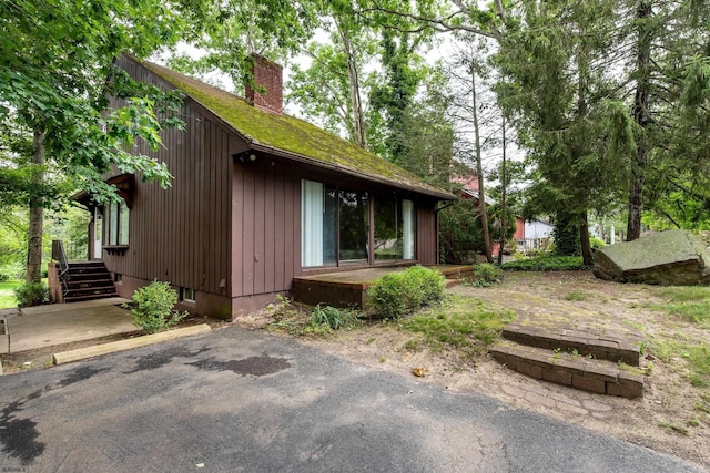 3821 Brookhaven Dr, Vineland, NJ 08361 - view of side of home featuring a chimney