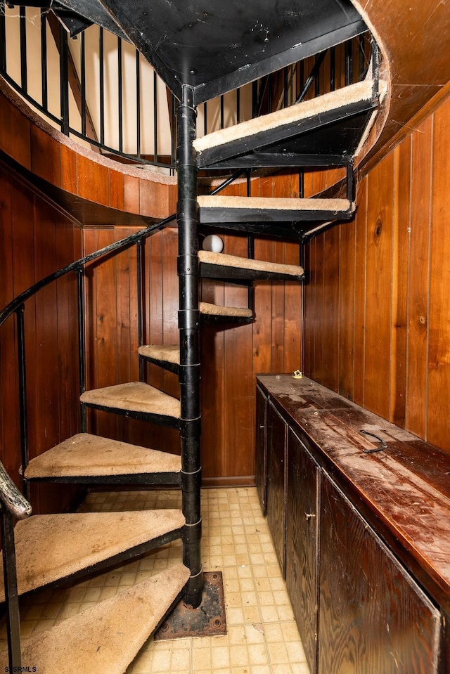 3821 Brookhaven Dr, Vineland, NJ 08361 - stairs featuring tile patterned floors and wooden walls