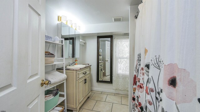 25 W 14th St Unit 1, Ocean City, NJ 08226 - full bathroom with vanity and tile patterned floors