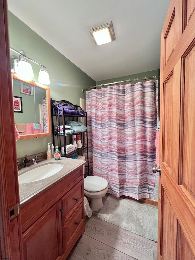 5323 S Carolina Ave, Mullica Township, NJ 08215 - bathroom with wood finished floors, vanity, and a shower with curtain