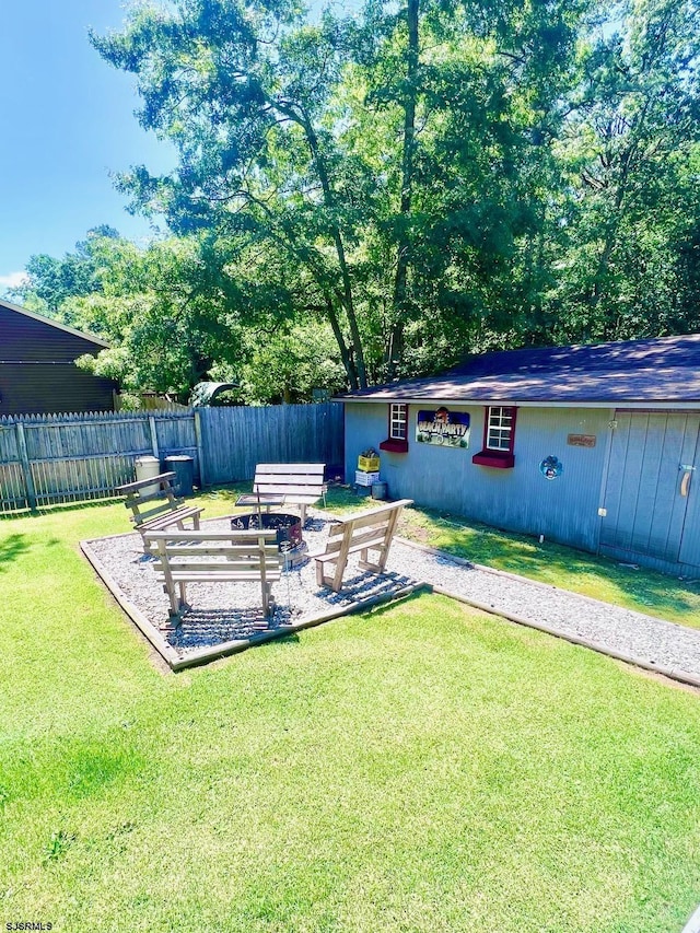 5323 S Carolina Ave, Mullica Township, NJ 08215 - view of yard featuring a fire pit