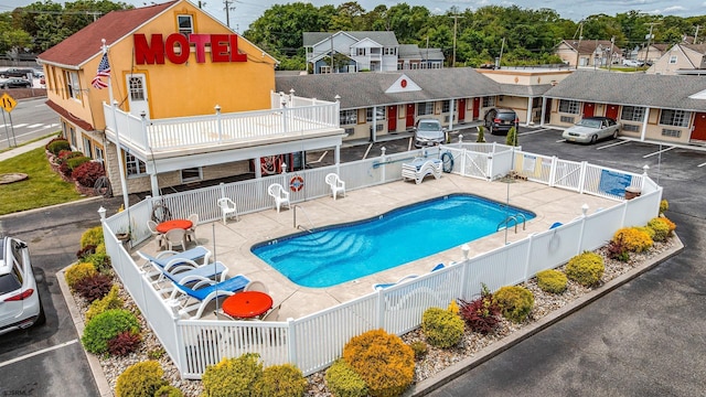301 Mays Landing Rd, Somers Point, NJ 08244 - community pool featuring a fenced backyard, a gate, and a patio