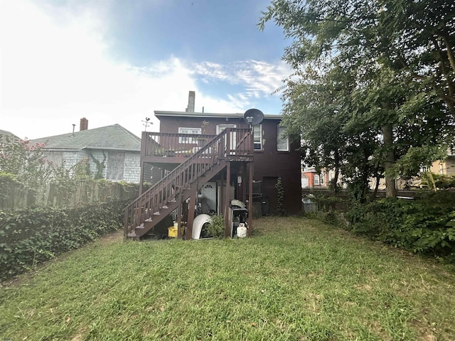 614 Caspian Ave, Atlantic City, NJ 08401 - rear view of property featuring stairway, a lawn, and a deck