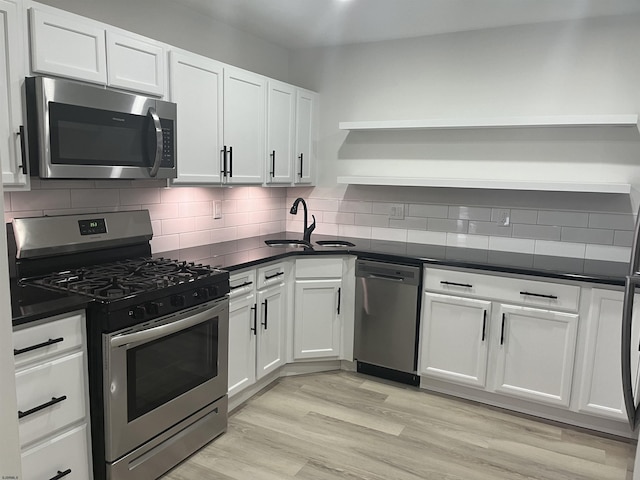 41 Arapaho Pl Unit 41, Galloway Township, NJ 08205 - kitchen featuring appliances with stainless steel finishes, open shelves, and dark countertops