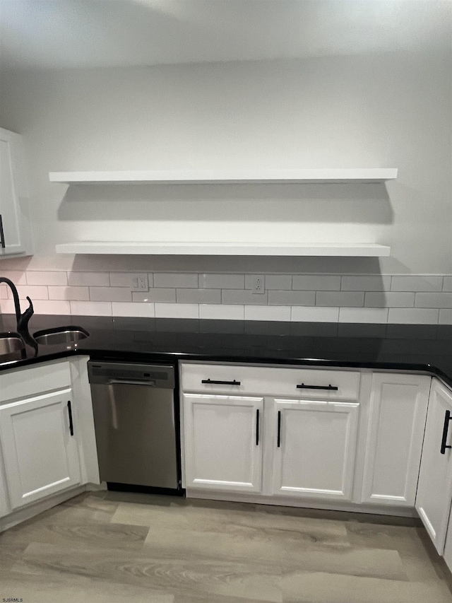 41 Arapaho Pl Unit 41, Galloway Township, NJ 08205 - kitchen featuring stainless steel dishwasher, open shelves, white cabinetry, decorative backsplash, and dark countertops