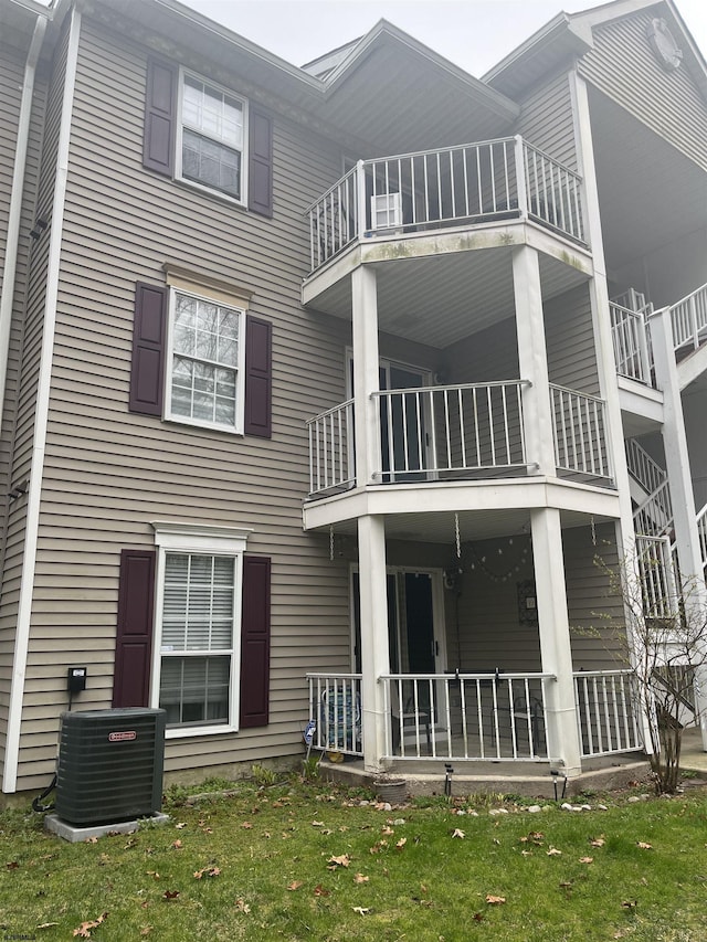 41 Arapaho Pl Unit 41, Galloway Township, NJ 08205 - back of house with a balcony and a yard