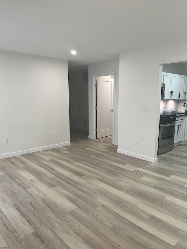 41 Arapaho Pl Unit 41, Galloway Township, NJ 08205 - unfurnished living room featuring light wood finished floors and recessed lighting