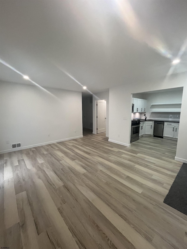 41 Arapaho Pl Unit 41, Galloway Township, NJ 08205 - unfurnished living room featuring light wood-type flooring and baseboards