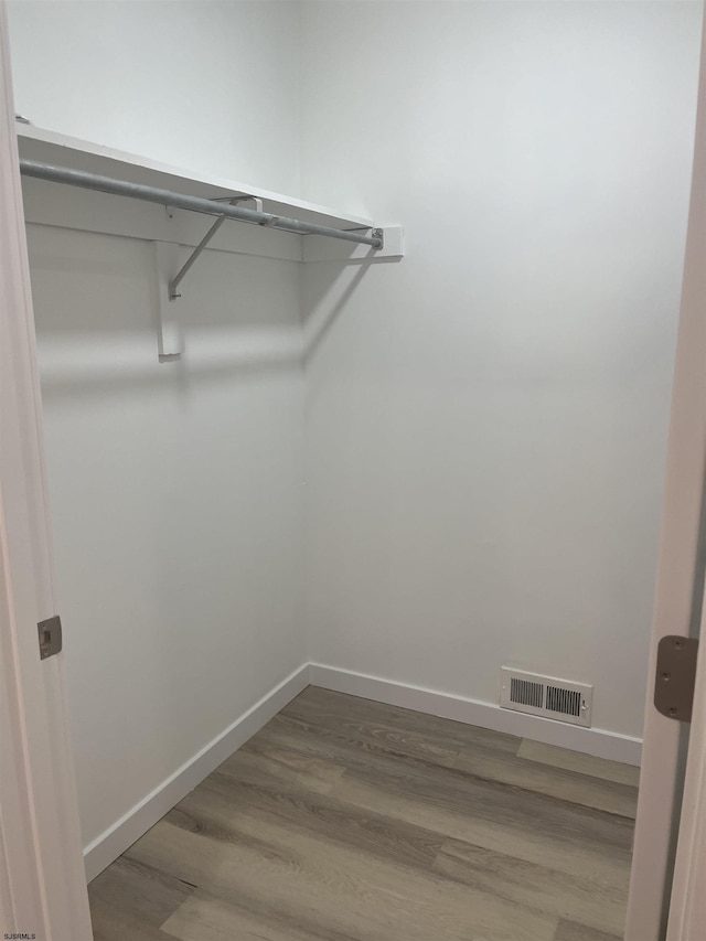 41 Arapaho Pl Unit 41, Galloway Township, NJ 08205 - walk in closet with wood finished floors