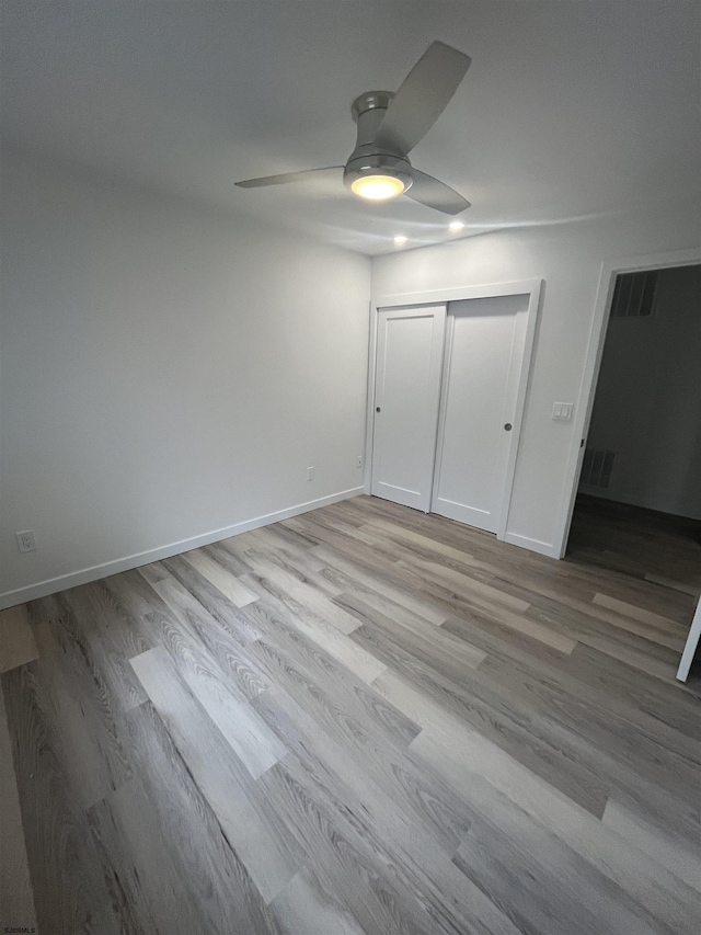 41 Arapaho Pl Unit 41, Galloway Township, NJ 08205 - unfurnished bedroom featuring wood finished floors, a closet, and ceiling fan
