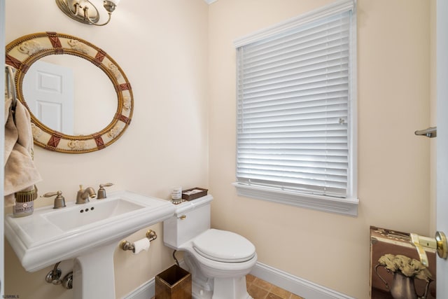 33 N Jefferson Ave, Margate, NJ 08402 - bathroom featuring baseboards and toilet