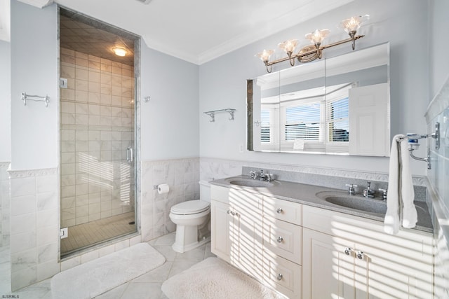 33 N Jefferson Ave, Margate, NJ 08402 - full bath featuring double vanity, a shower stall, tile walls, tile patterned flooring, and crown molding