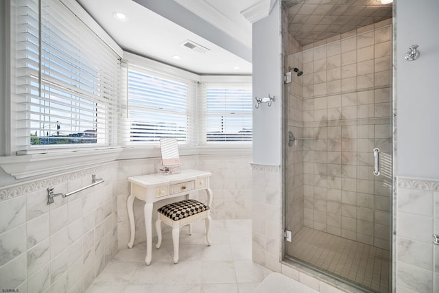 33 N Jefferson Ave, Margate, NJ 08402 - bathroom featuring tile walls, a shower stall, healthy amount of natural light, recessed lighting, and wainscoting
