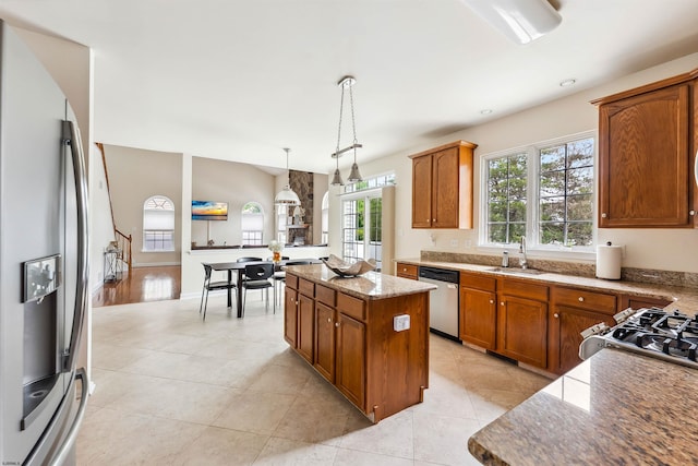 95 Knights Bridge Way, Mays Landing, NJ 08402 - kitchen with stainless steel appliances, healthy amount of natural light, a center island, brown cabinetry, and recessed lighting