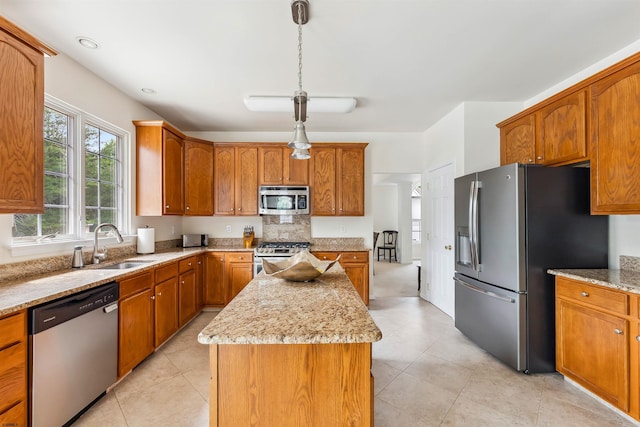 95 Knights Bridge Way, Mays Landing, NJ 08402 - kitchen with stainless steel appliances, a center island, and brown cabinets