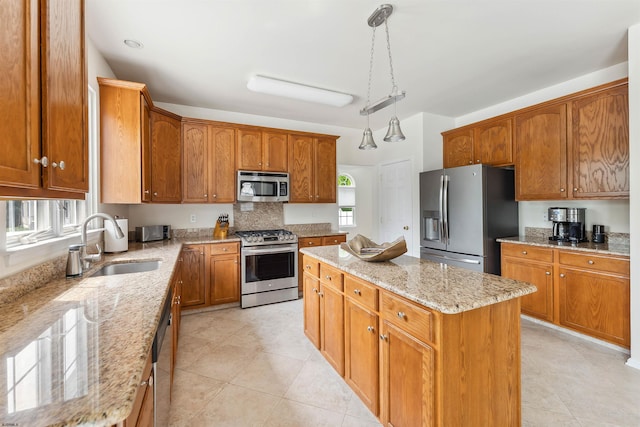 95 Knights Bridge Way, Mays Landing, NJ 08402 - kitchen with stainless steel appliances, healthy amount of natural light, a center island, and brown cabinets