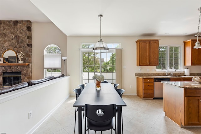 95 Knights Bridge Way, Mays Landing, NJ 08402 - kitchen featuring dishwasher, brown cabinetry, and healthy amount of natural light