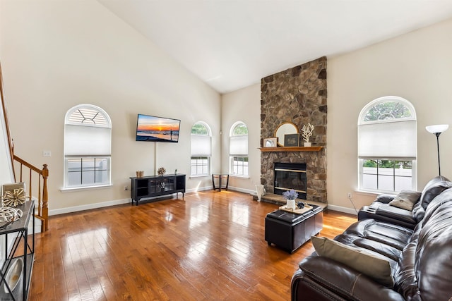 95 Knights Bridge Way, Mays Landing, NJ 08402 - living area featuring high vaulted ceiling, hardwood / wood-style floors, stairs, and a fireplace