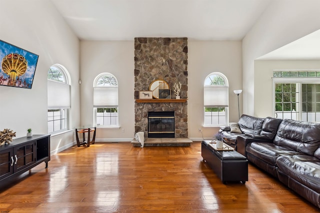 95 Knights Bridge Way, Mays Landing, NJ 08402 - living area featuring plenty of natural light, hardwood / wood-style flooring, a fireplace, and a high ceiling