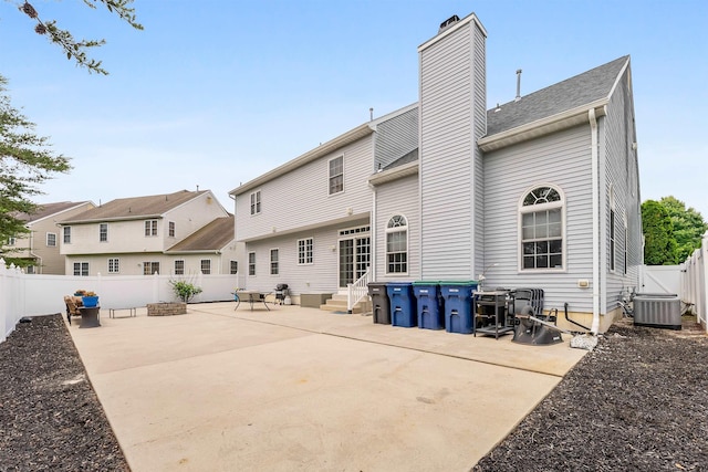95 Knights Bridge Way, Mays Landing, NJ 08402 - rear view of property with a chimney, entry steps, a patio, and a fenced backyard