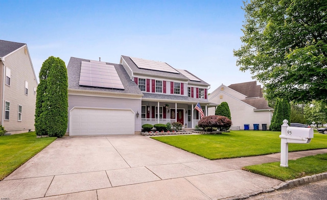 95 Knights Bridge Way, Mays Landing, NJ 08402 - view of front of house featuring covered porch, a front lawn, driveway, solar panels, and an attached garage