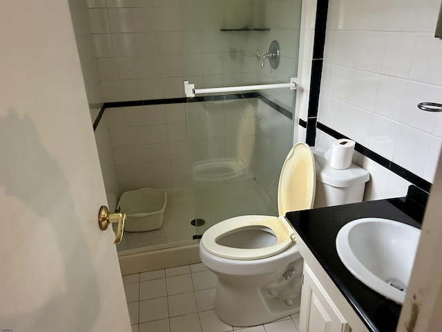 733 W Duerer St, Galloway Township, NJ 08215 - bathroom featuring a shower stall, vanity, tile patterned floors, and tile walls