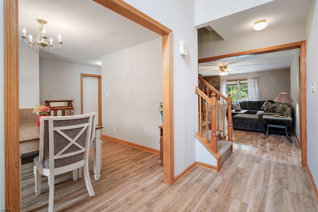 10 Hillside Ave, New Gretna, NJ 08087 - corridor with light wood-style floors, stairs, and a chandelier