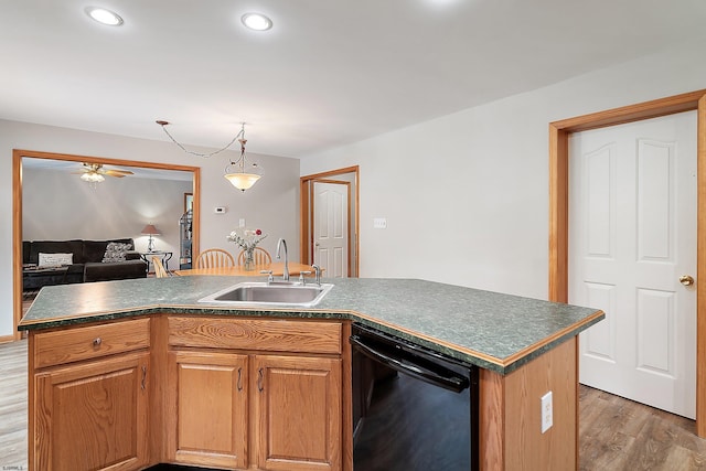 10 Hillside Ave, New Gretna, NJ 08087 - kitchen with dishwasher, dark countertops, light wood-type flooring, ceiling fan, and recessed lighting