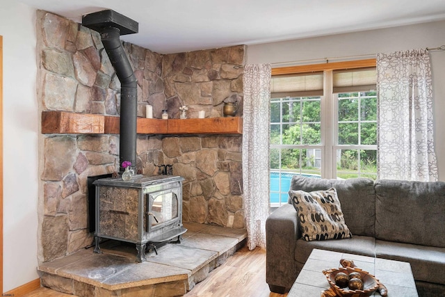 10 Hillside Ave, New Gretna, NJ 08087 - living area with wood finished floors and a wood stove