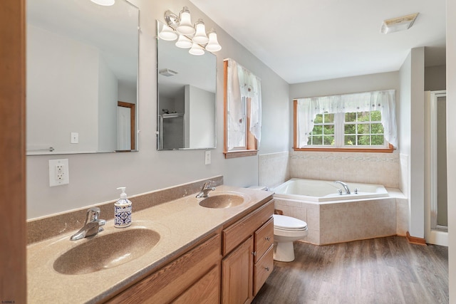 10 Hillside Ave, New Gretna, NJ 08087 - bathroom with wood finished floors, a bath, double vanity, and a shower stall