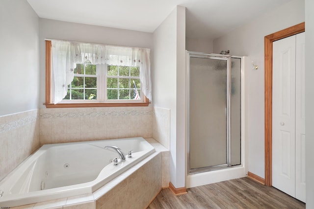 10 Hillside Ave, New Gretna, NJ 08087 - bathroom with a shower stall, a jetted tub, and wood finished floors